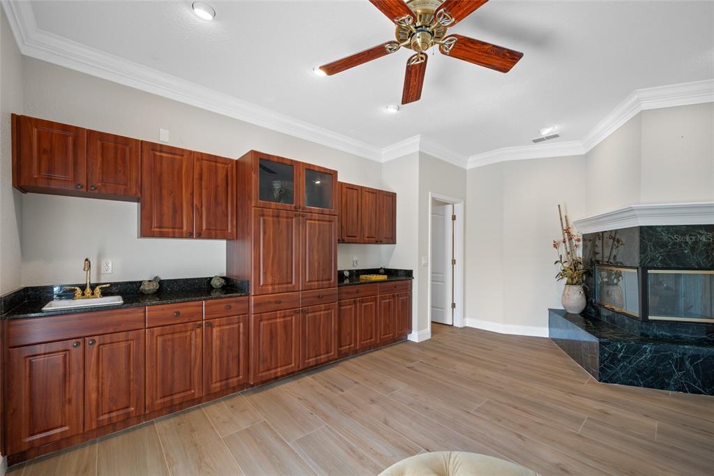 11939 Pasco Trails Boulevard Spring Hill, FL 34610 - Photo 13 of 61 a kitchen with stainless steel appliances granite countertop a refrigerator a sink dishwasher stove and oven