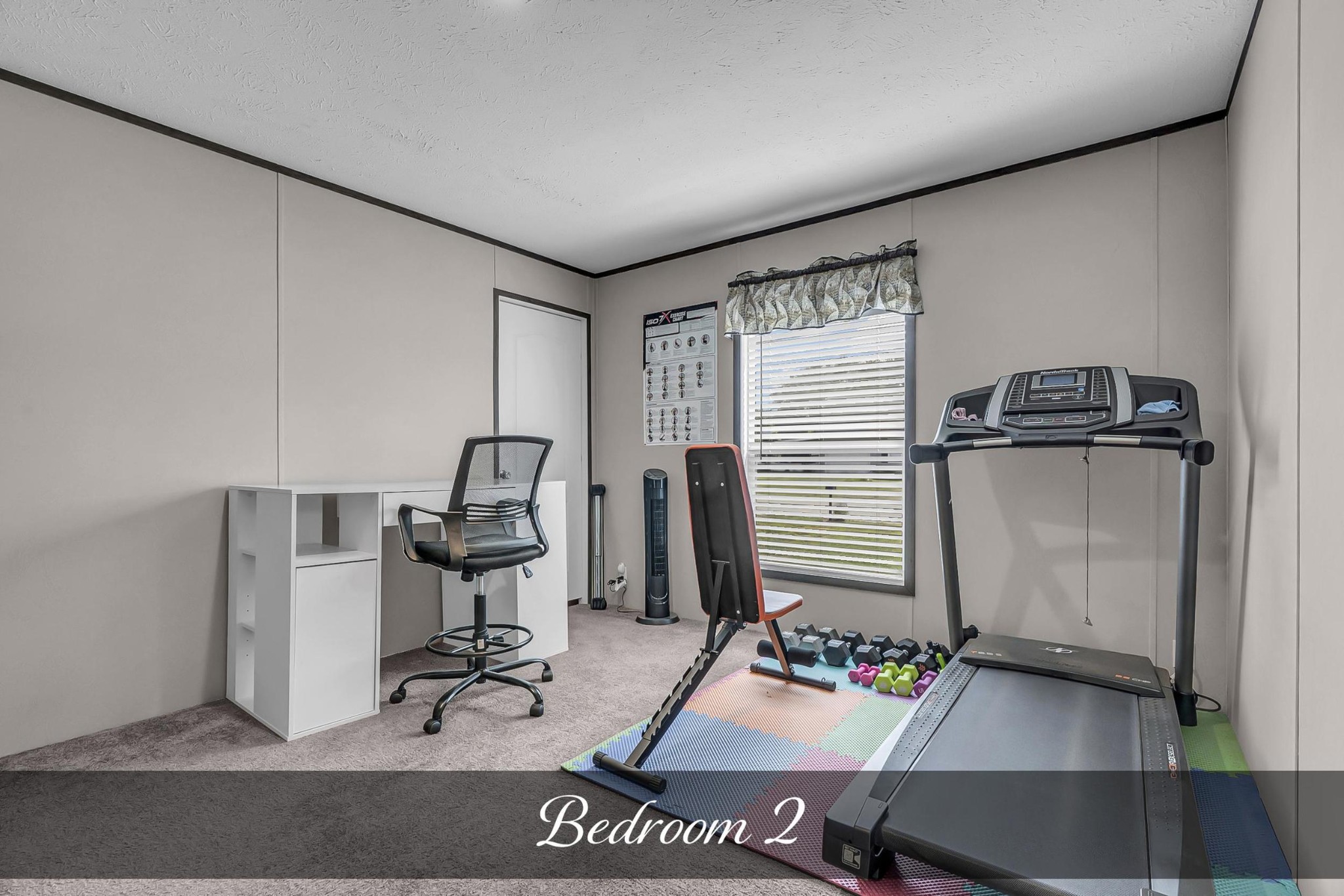 599 Days Road Lafayette, TN 37083 - Photo 16 of 32 a room with furniture and gym equipment