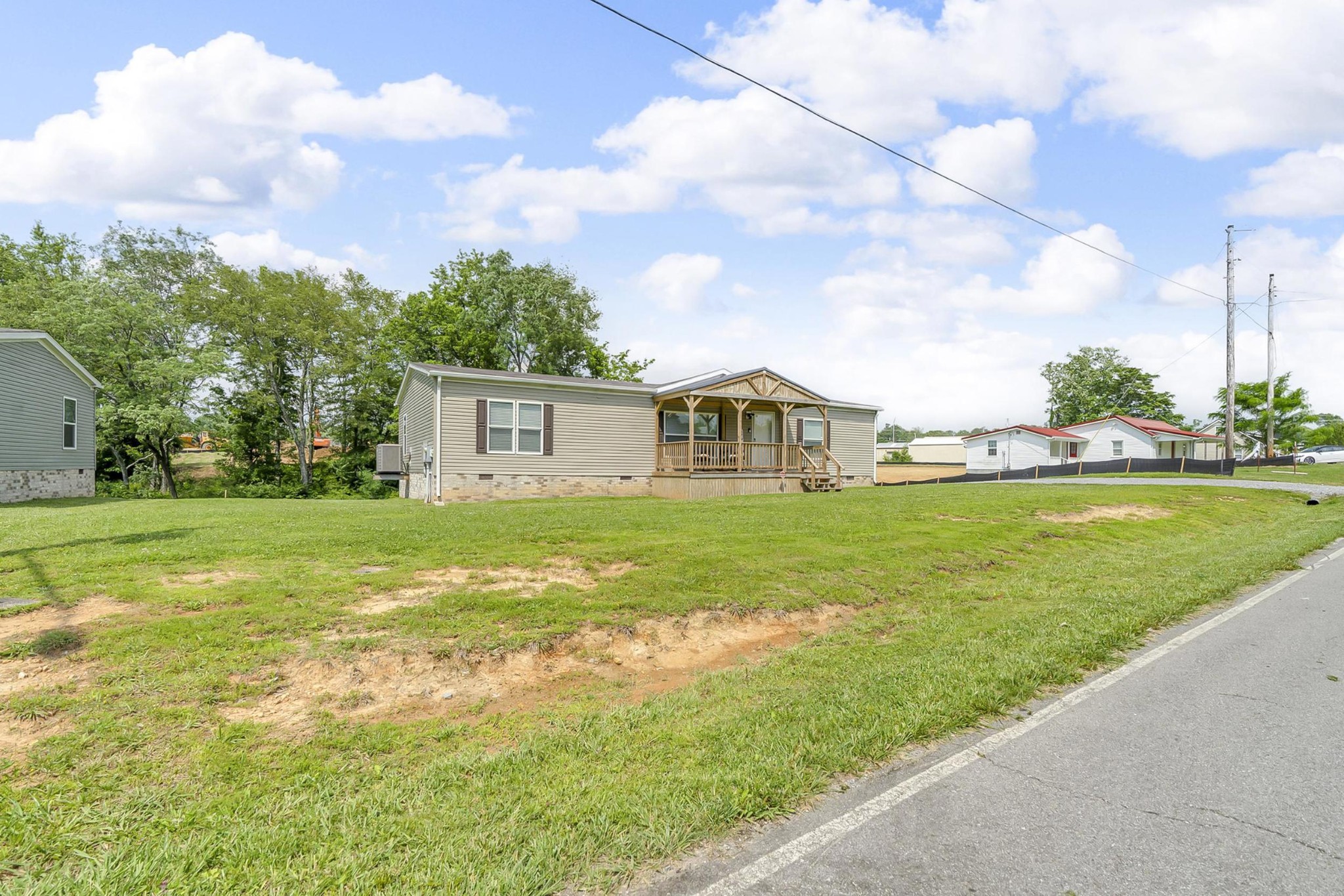 599 Days Road Lafayette, TN 37083 - Photo 25 of 32 a view of a house with a yard