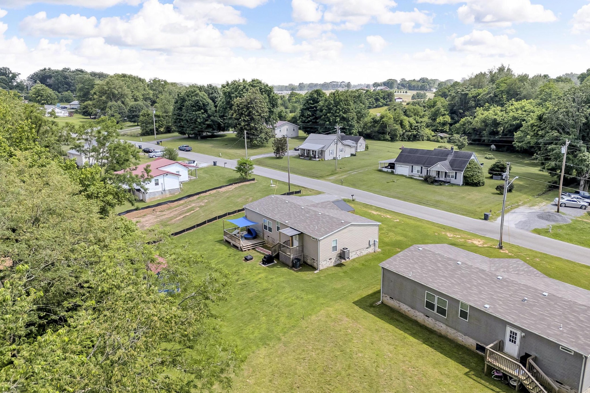 599 Days Road Lafayette, TN 37083 - Photo 30 of 32 an aerial view of a house with outdoor space