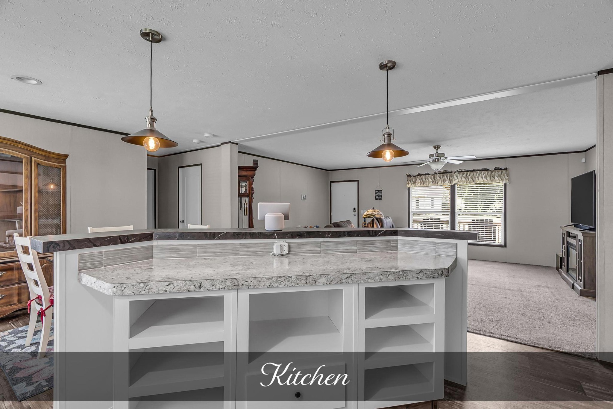 599 Days Road Lafayette, TN 37083 - Photo 6 of 32 a kitchen with kitchen island a counter top space appliances and a counter top space