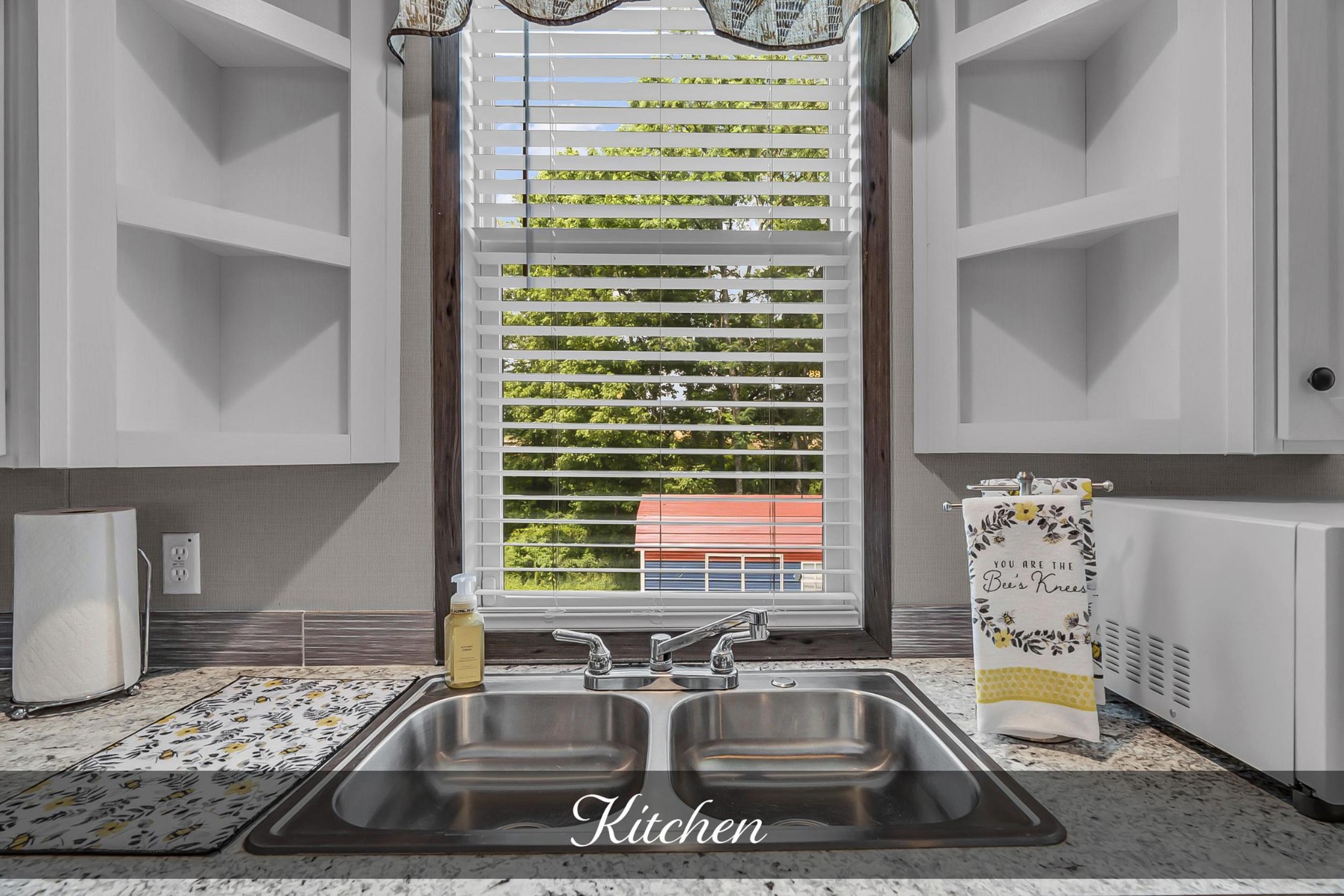 599 Days Road Lafayette, TN 37083 - Photo 8 of 32 a kitchen with a sink and a stove top oven