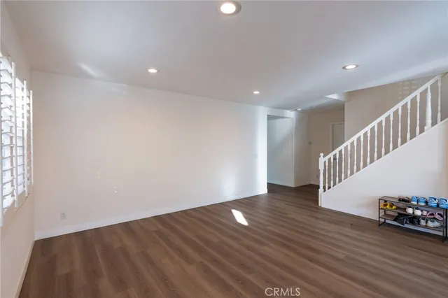 a view of entryway with wooden floor