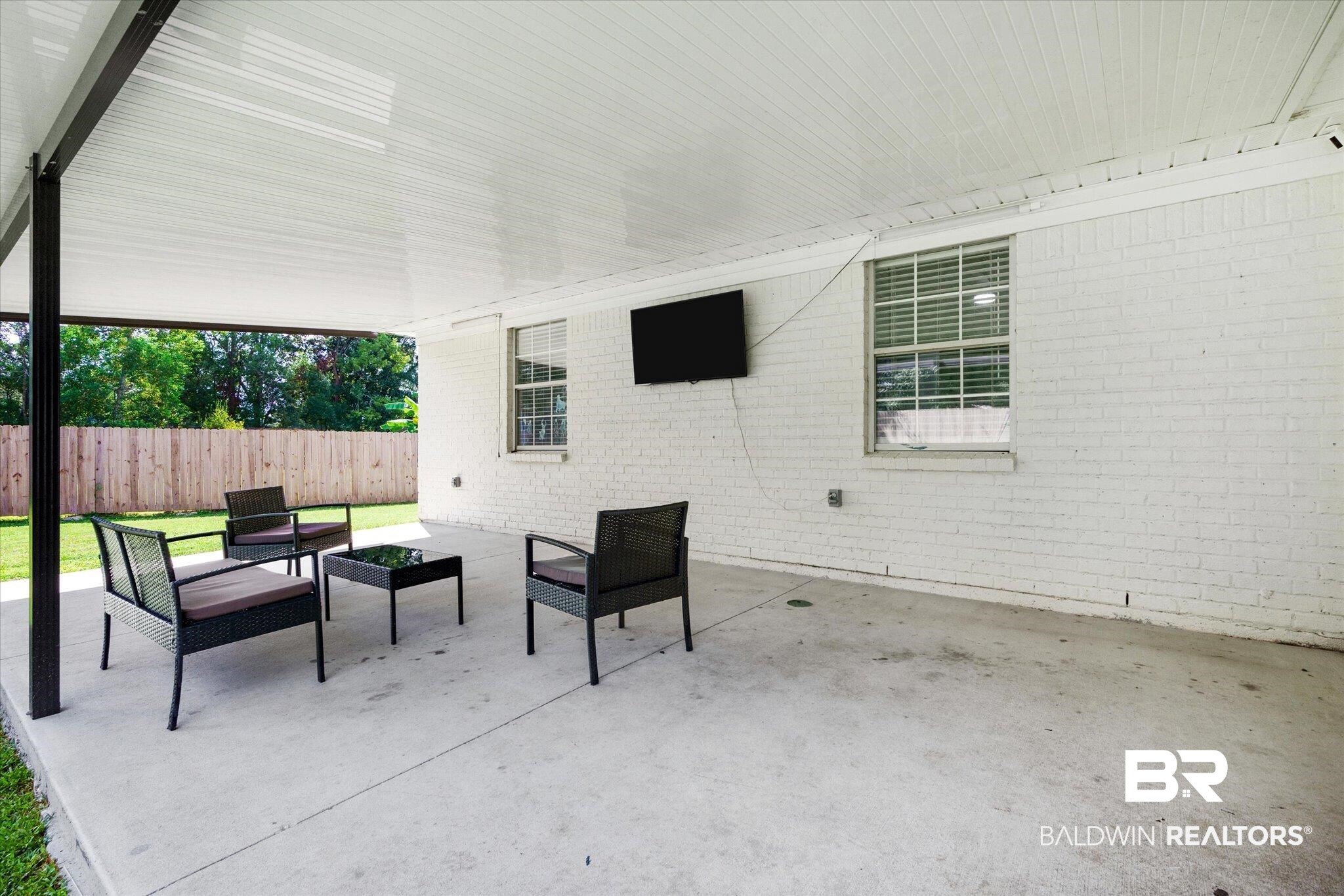 15 Magnolia Circle Foley, AL 36535 - Photo 26 of 31 Back Covered Porch