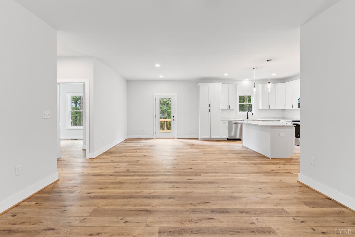 594 Community Road Dillwyn, VA 23936 - Photo 19 of 52 a view of a kitchen with a sink and a refrigerator