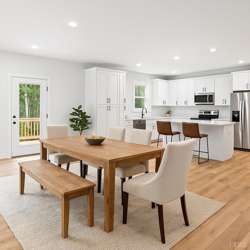 594 Community Road Dillwyn, VA 23936 - Photo 8 of 52 a view of a dining room with furniture
