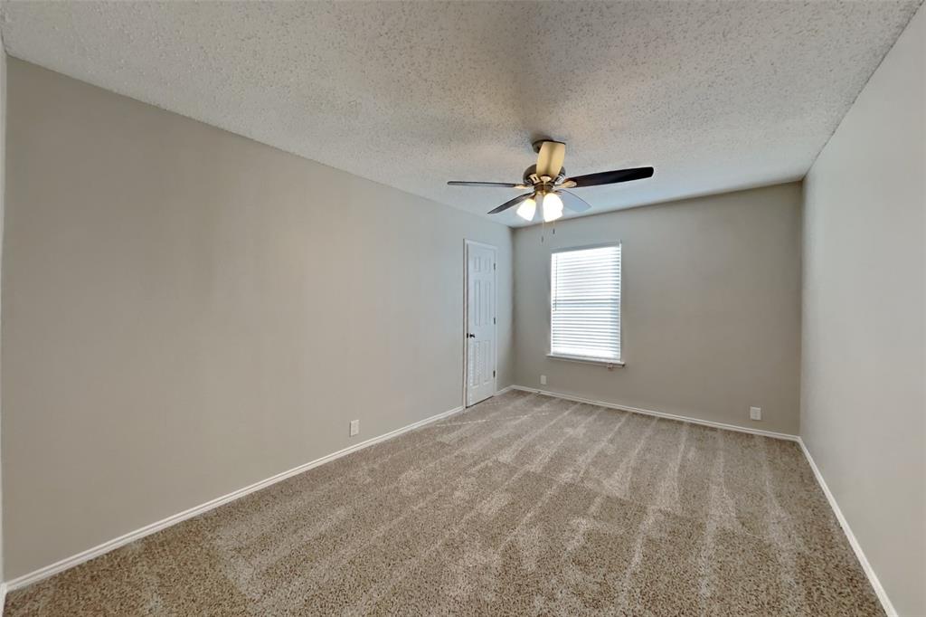 1320 Stetson Trail Saginaw, TX 76131 - Photo 11 of 19 a view of an empty room with a window