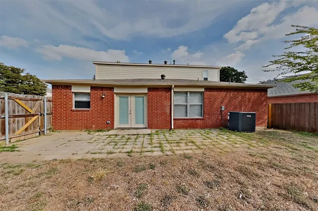 a house with yard in front of it