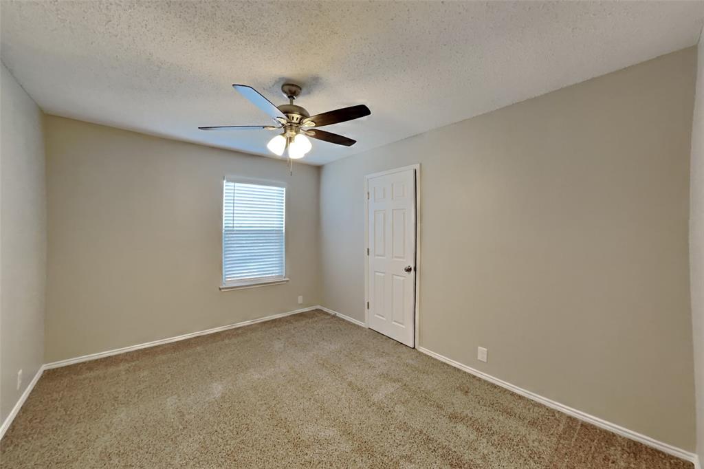 1320 Stetson Trail Saginaw, TX 76131 - Photo 10 of 19 a view of an empty room with a window