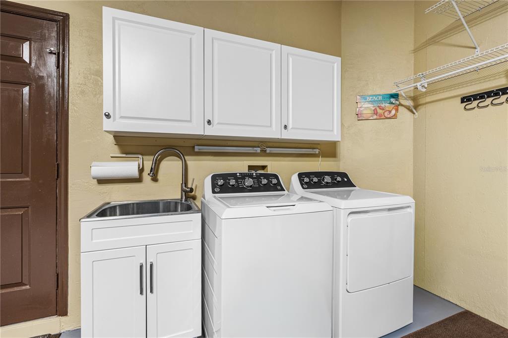 124 Rose Bank Road Daytona Beach, FL 32114 - Photo 40 of 43 a utility room with dryer and washer