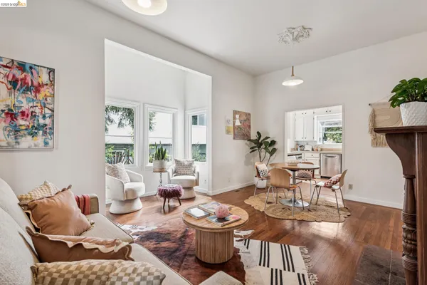 a living room with furniture and a table