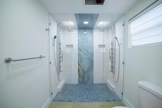 a bathroom with a sink and vanity