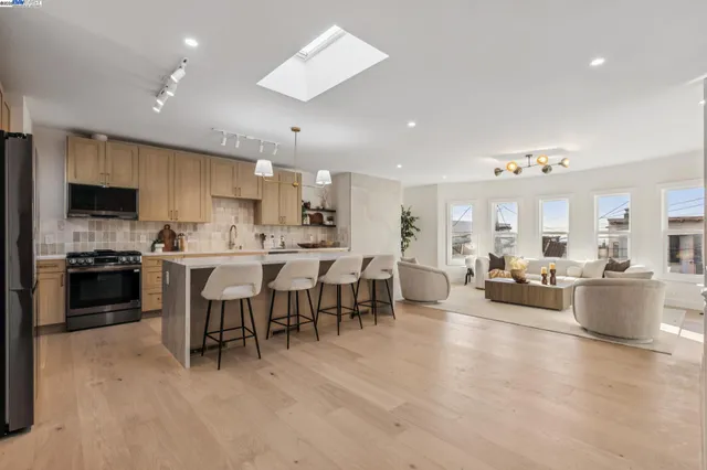 a kitchen with a sink and a window