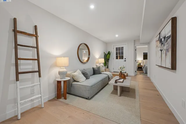 a view of a balcony with a yard