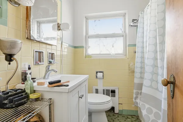 a bedroom with a bed and a closet