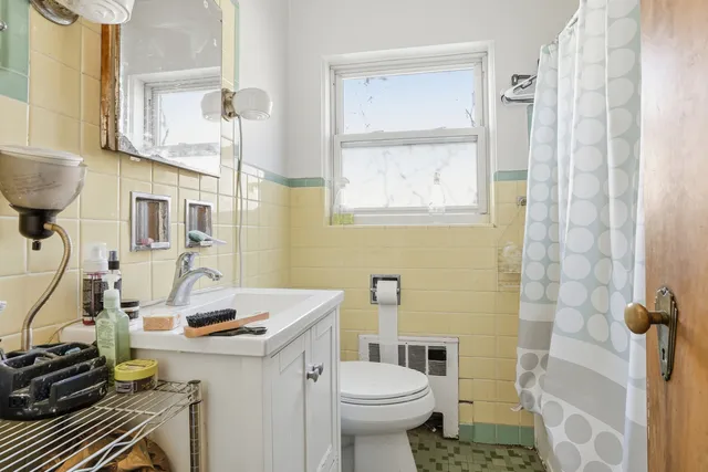 a bedroom with a bed and a closet