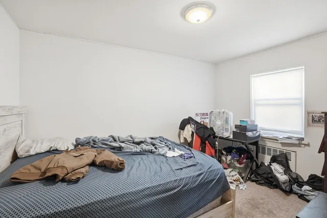 a kitchen with refrigerator cabinets and stove