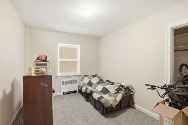 a kitchen with a stove and a refrigerator