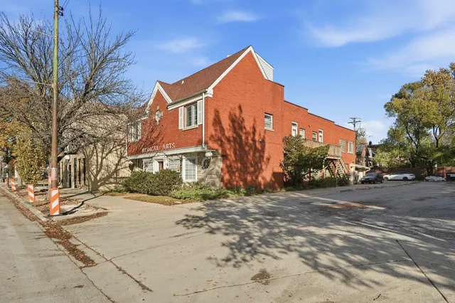 an aerial view of a house with a ocean view