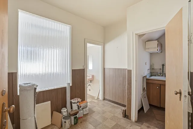 a view of walk in closet with window