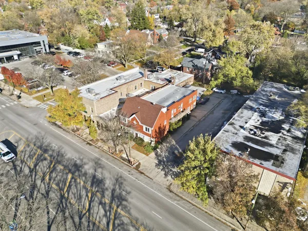 an aerial view of residential building with parking space