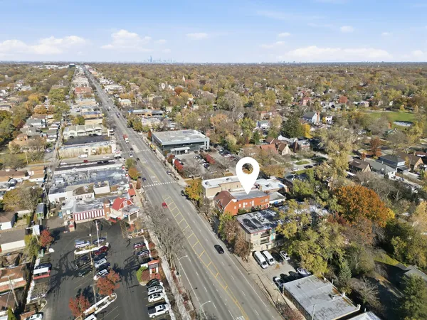 a view of a balcony with wooden floor and stairs