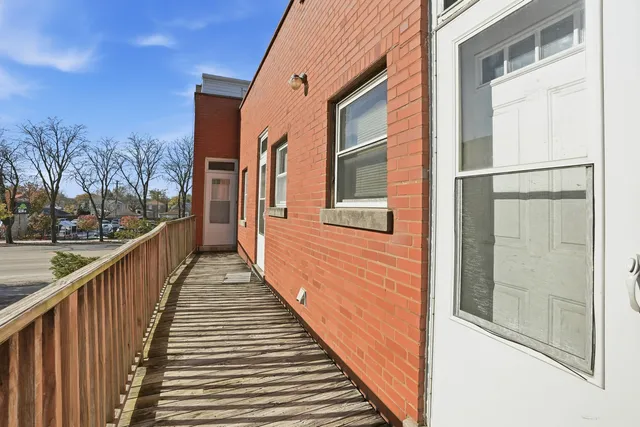 a kitchen with a sink cabinets and appliances