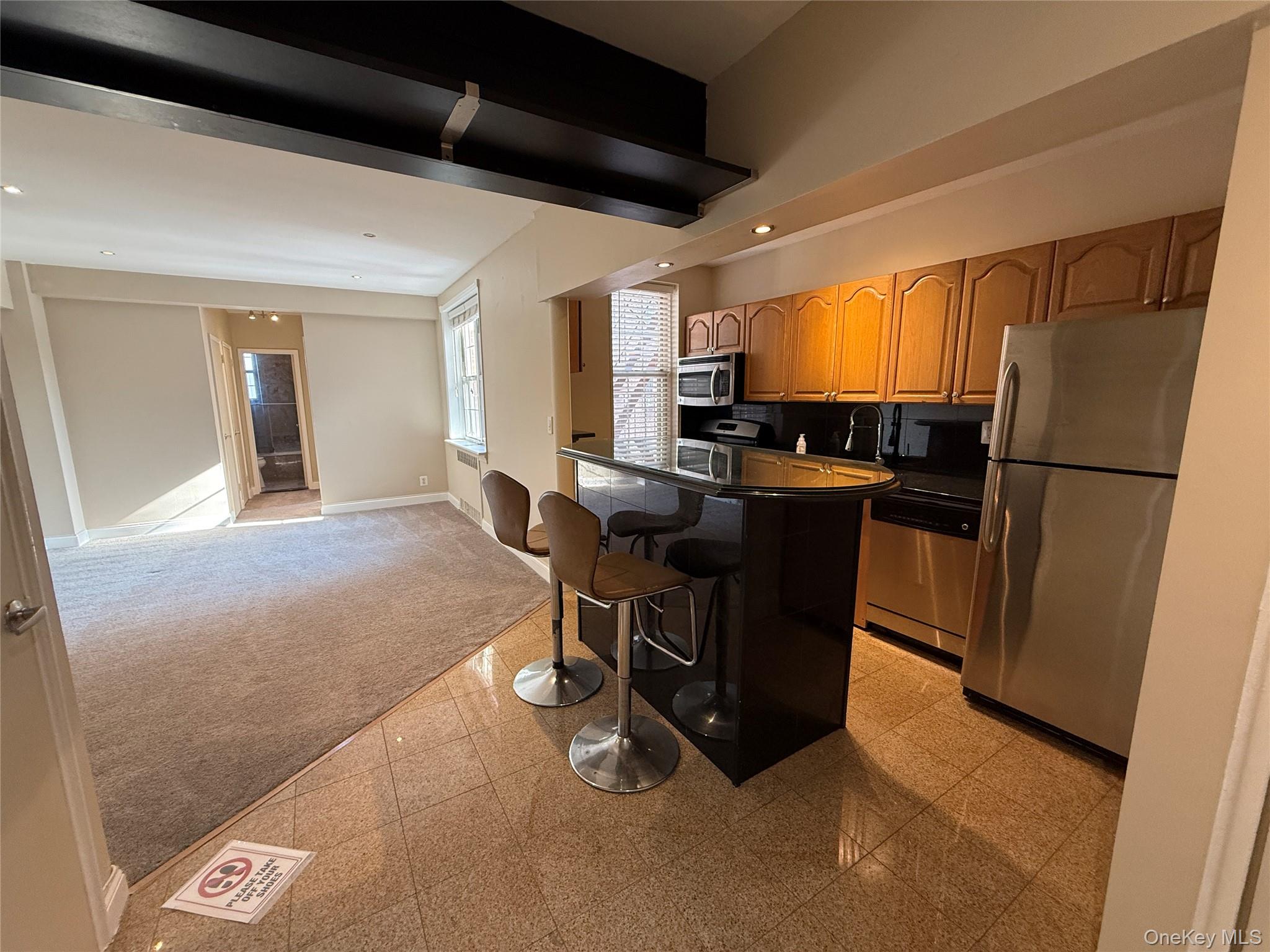 796 Bronx River Road, Unit B38 Bronxville, NY 10708 - Photo 26 of 31 a dining room with furniture and a window