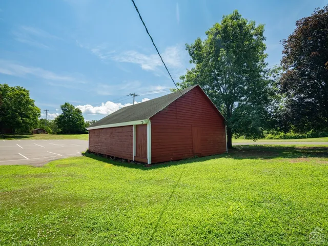 a aerial view of a house with a yard