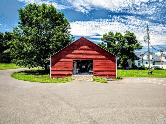 an aerial view of a house with a garden