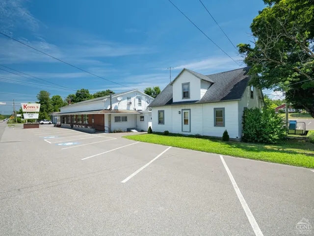 a view of a house with a patio