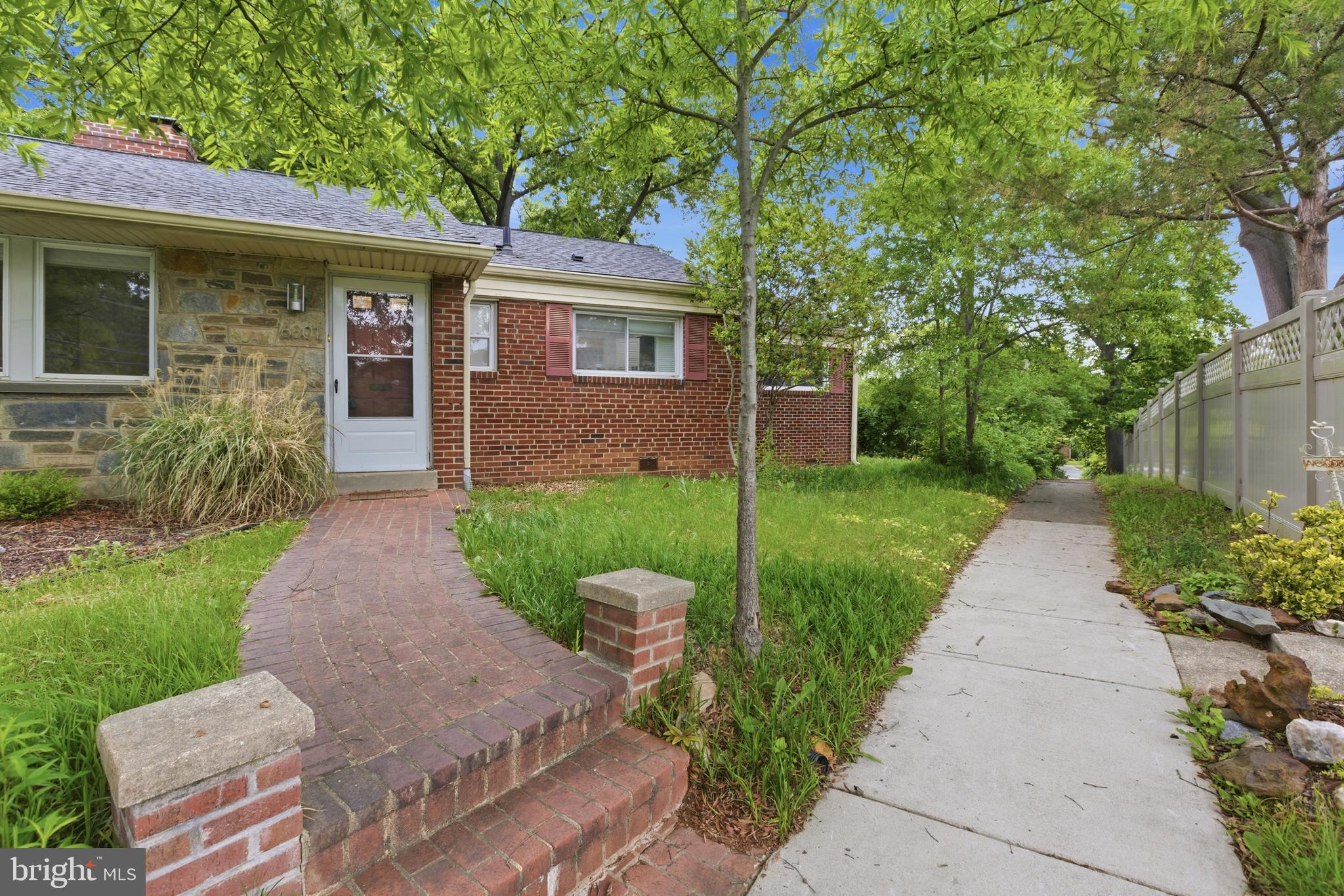 6801 Adelphi Road University Park, MD 20782 - Photo 2 of 26 Large front yard & path into the town.