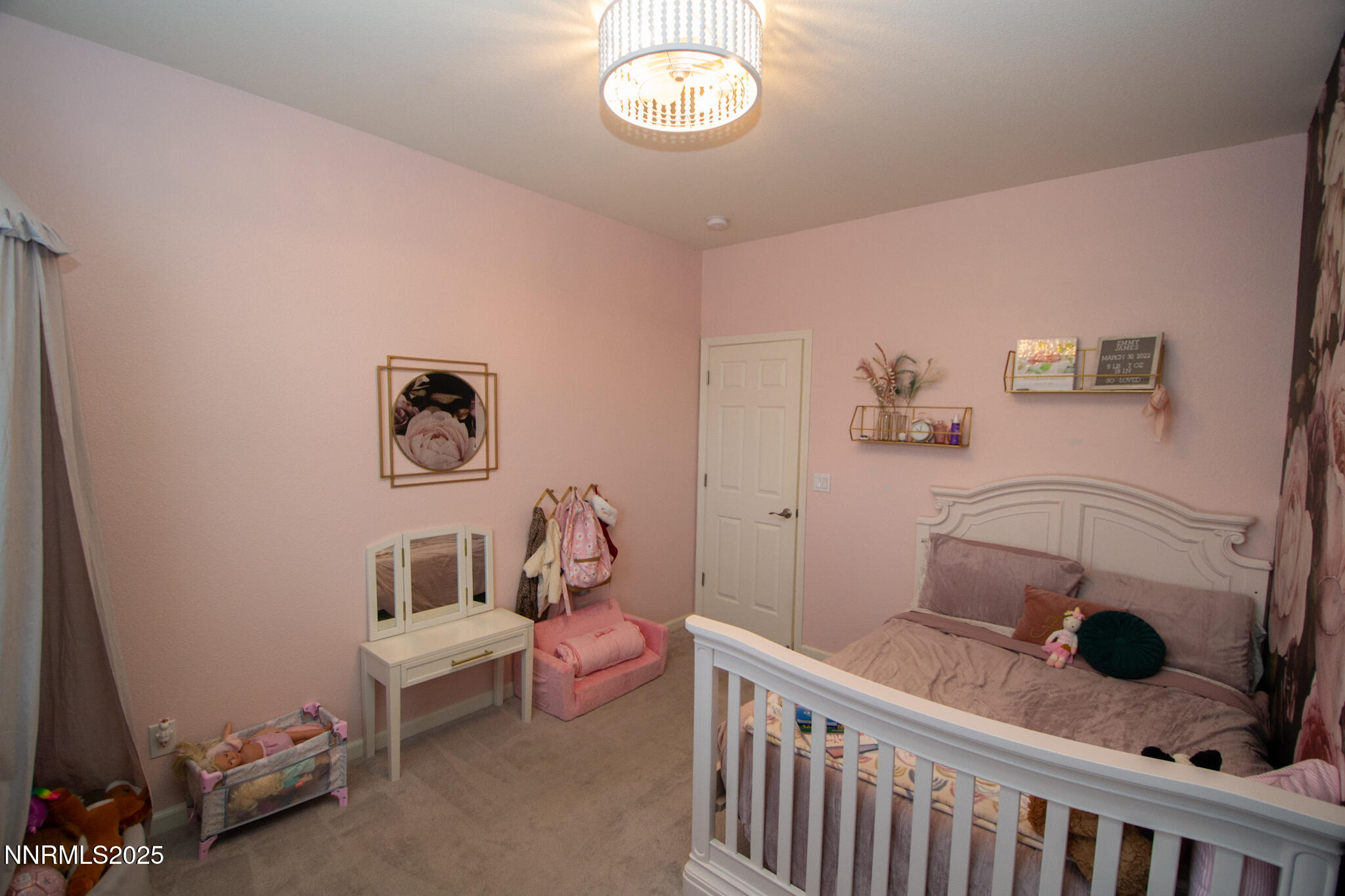 1056 Crown View Drive Reno, NV 89523 - Photo 16 of 27 a bedroom with a bed and wooden floor