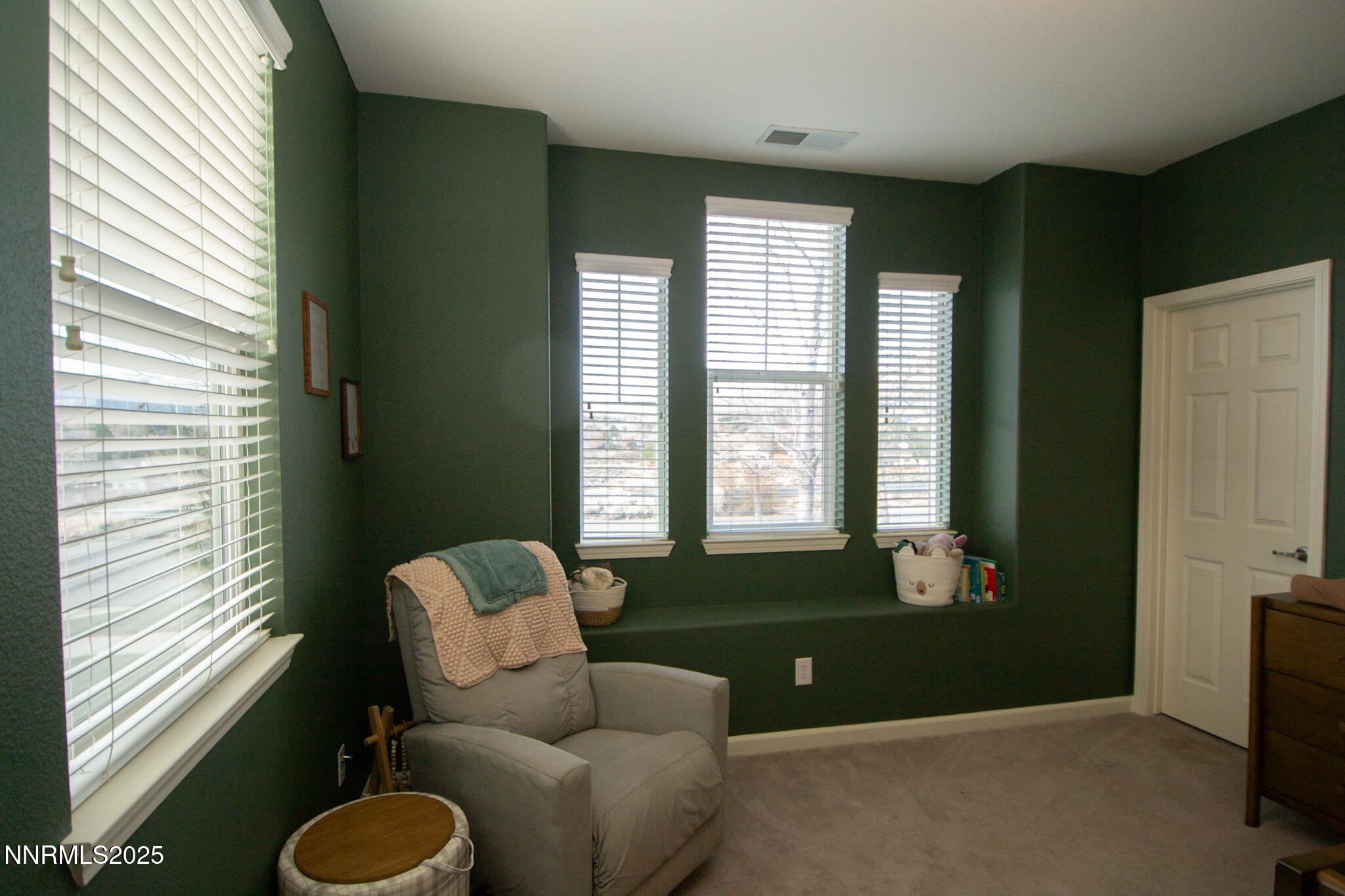 1056 Crown View Drive Reno, NV 89523 - Photo 18 of 27 a living room with furniture and a window
