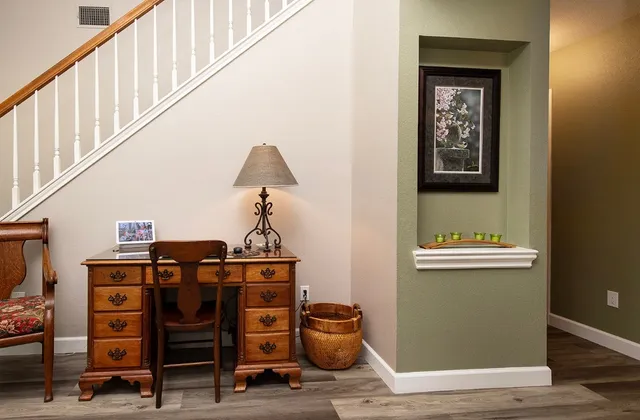 a view of a hallway with seating