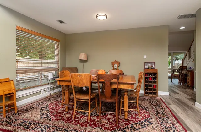 a view of a dining room with furniture