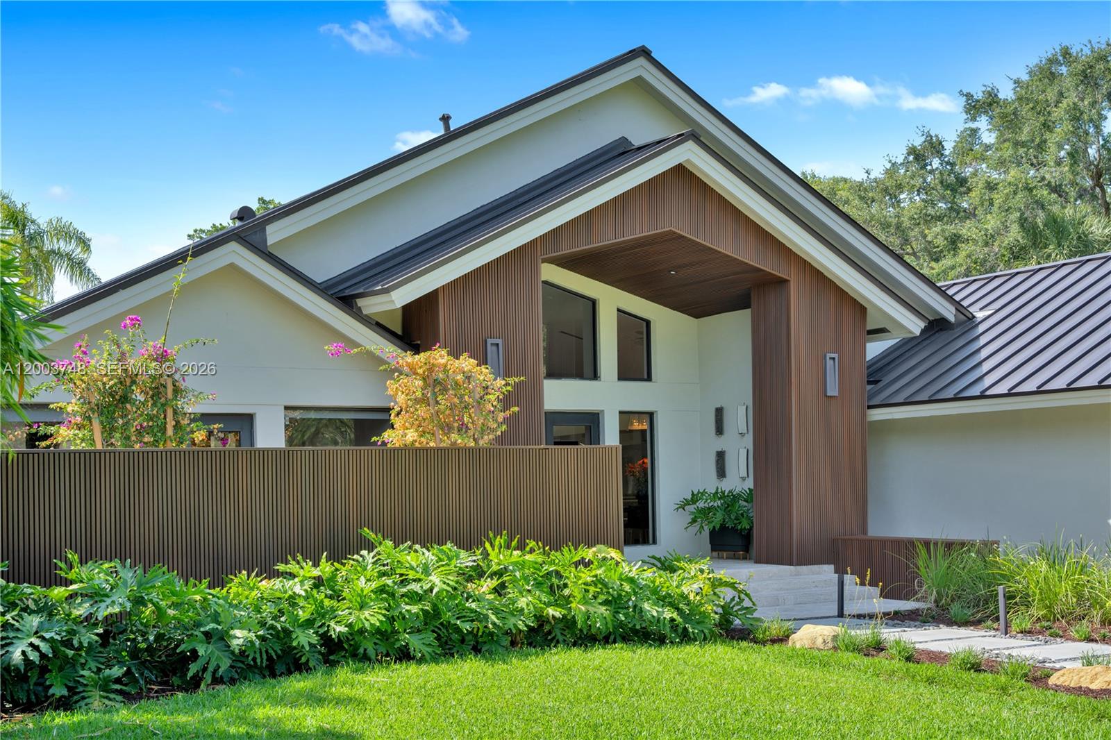2675 Hackney Road Weston, FL 33331 - Photo 2 of 61 a view of a house with a yard