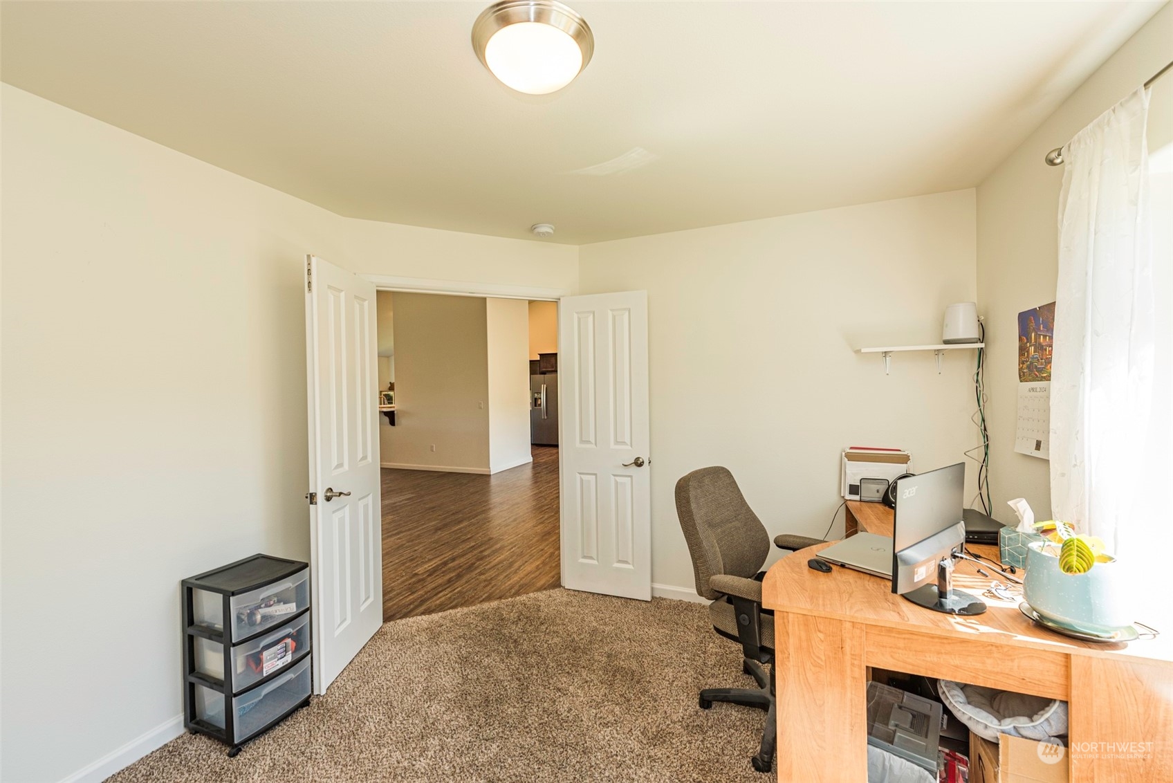 133 Guy Kelly Road Port Angeles, WA 98362 - Photo 6 of 40 a view of workspace with wooden floor windows