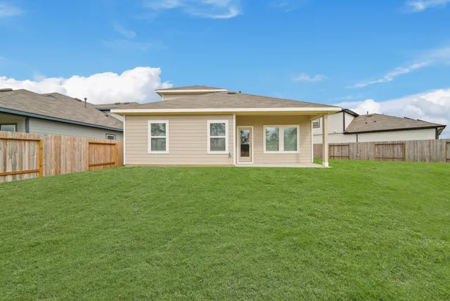 a view of a house with a big yard