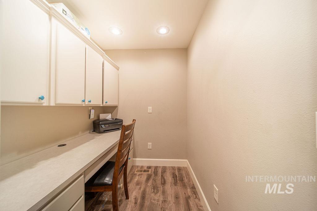 19809 Tammany Creek Road Lewiston, ID 83501 - Photo 23 of 50 Office space with built in study area, light wood finished floors, and recessed lighting