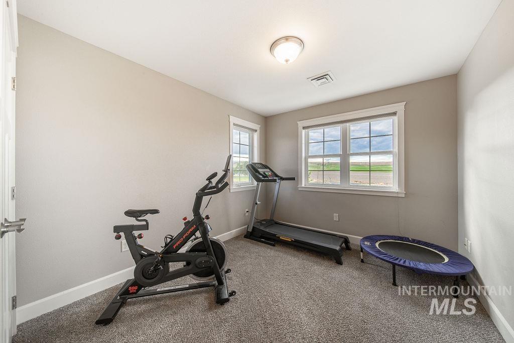 19809 Tammany Creek Road Lewiston, ID 83501 - Photo 34 of 50 Workout area with carpet and baseboards
