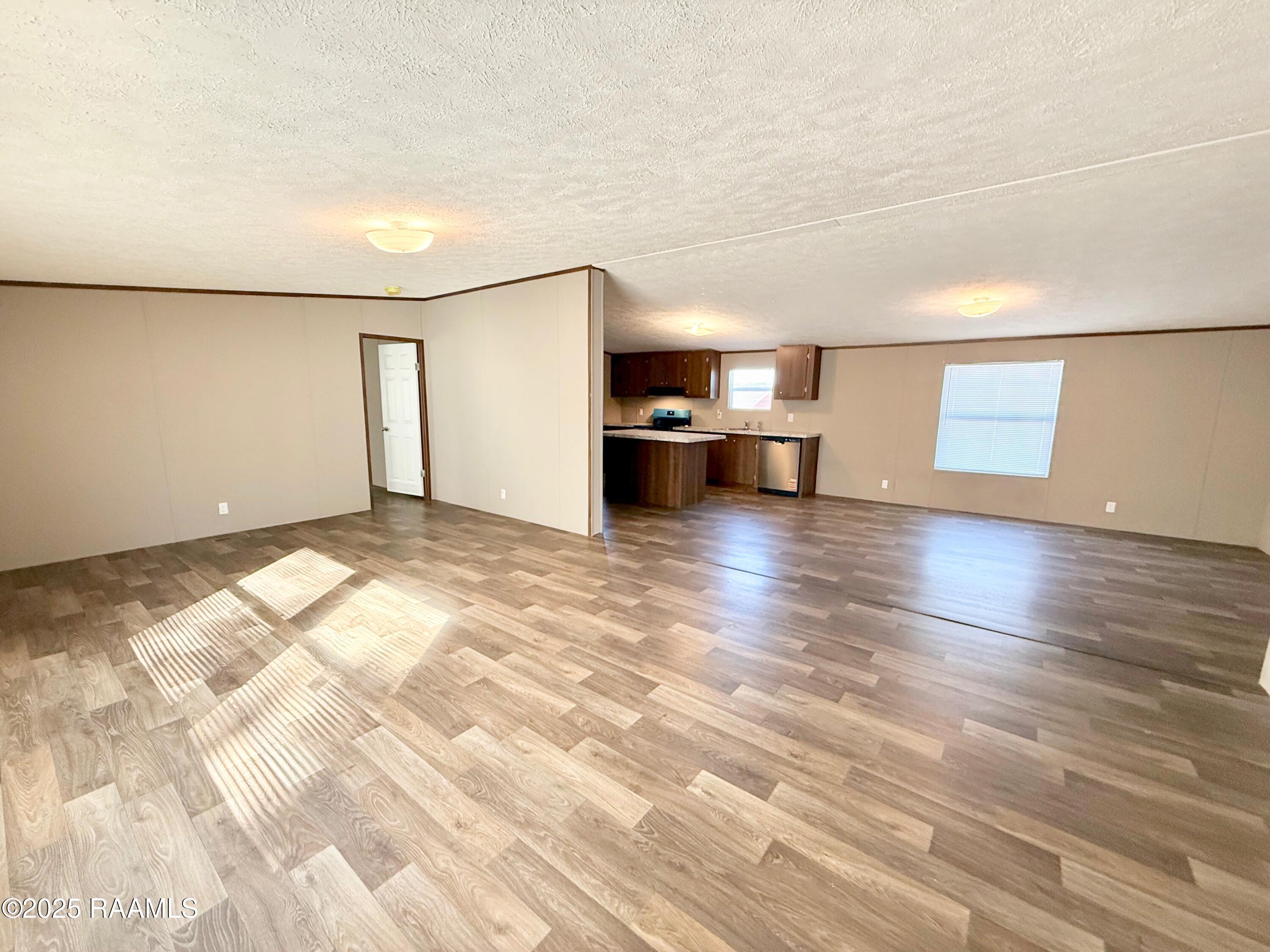 125 La Rue Cannes Duson, LA 70529 - Photo 8 of 40 living room/kitchen