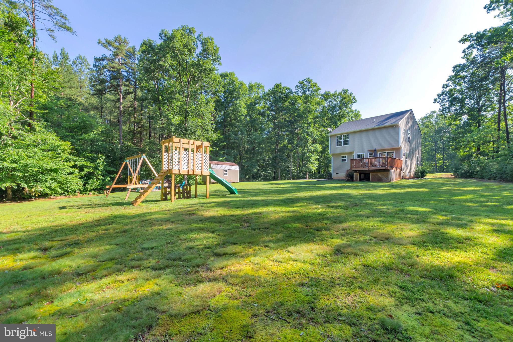 149 Dawns Ridge Louisa, VA 23093 - Photo 32 of 91 Back Yard leads to Walking trails