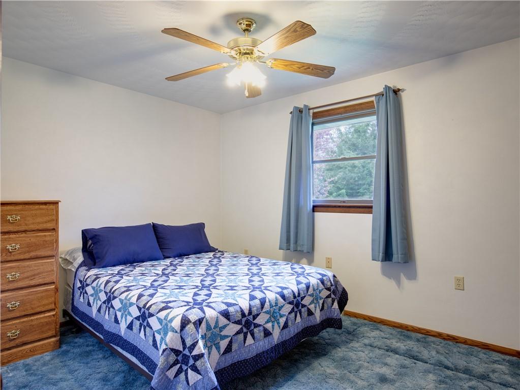 247 Medical Center Road Chicora, PA 16025 - Photo 12 of 24 a bedroom with a large bed and a window