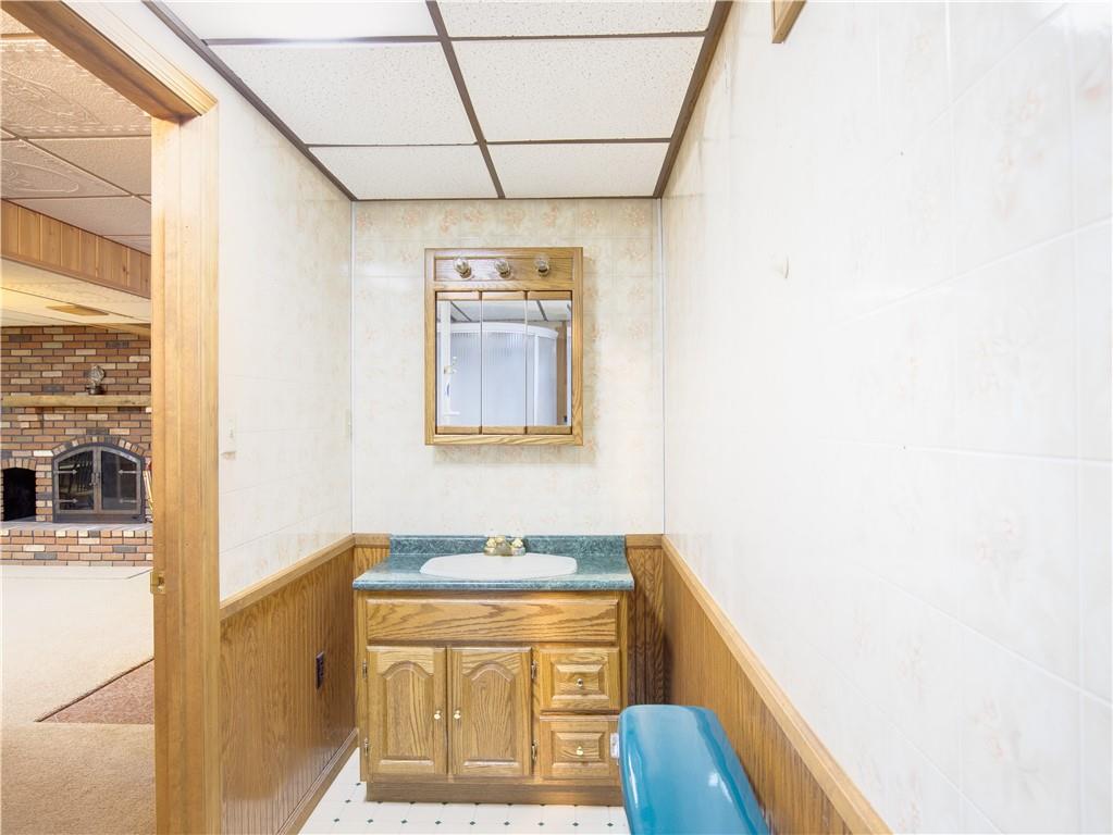 247 Medical Center Road Chicora, PA 16025 - Photo 19 of 24 a bathroom with a sink a vanity and mirror