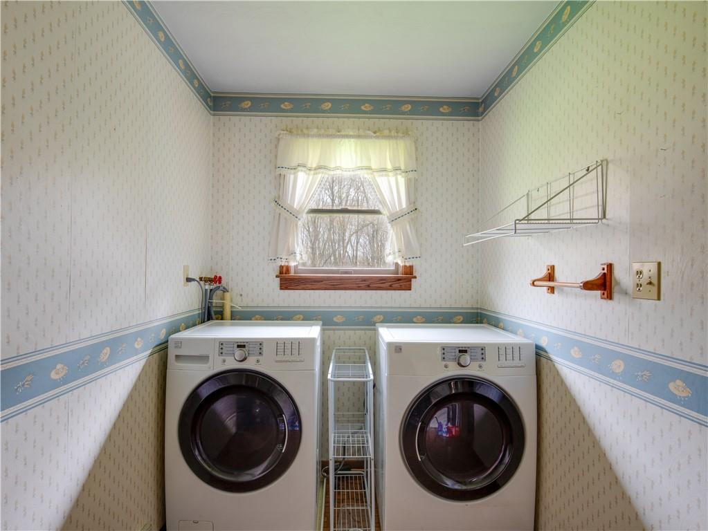 247 Medical Center Road Chicora, PA 16025 - Photo 22 of 24 a view of a hallway with washer and dryer