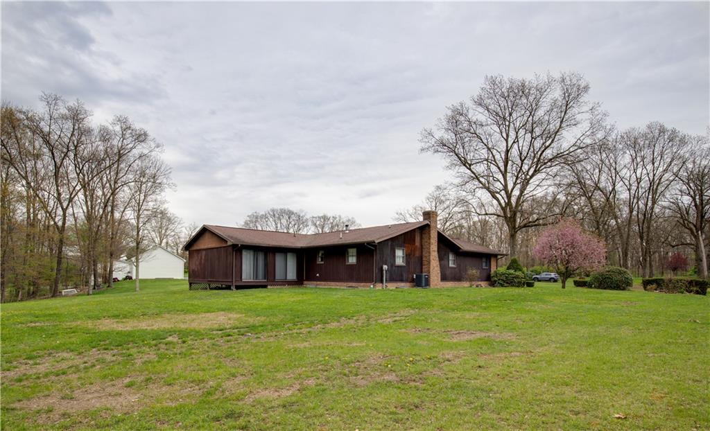 247 Medical Center Road Chicora, PA 16025 - Photo 23 of 24 a view of a house with a yard