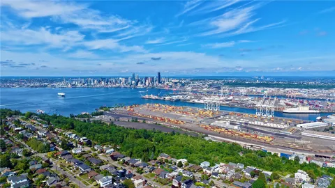 a view of a city with an ocean view