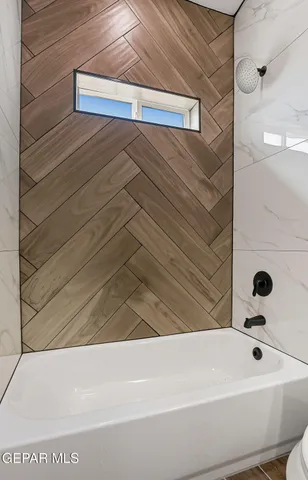 a bathroom with a bathtub