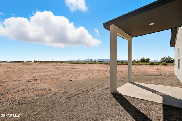 a view of a pool and an ocean view